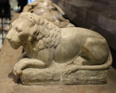 notre dame paris cathedral lion on medieval tomb simon matifas de bucy