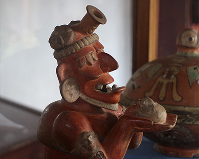 tikal museum maya old deity ceramic