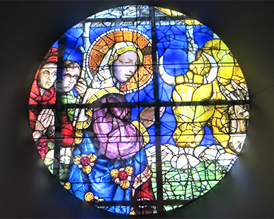 florence duomo cathedral mary nativity scene stained glass window in dome