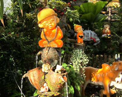 thailand wat doi suthep rock garden monk figures